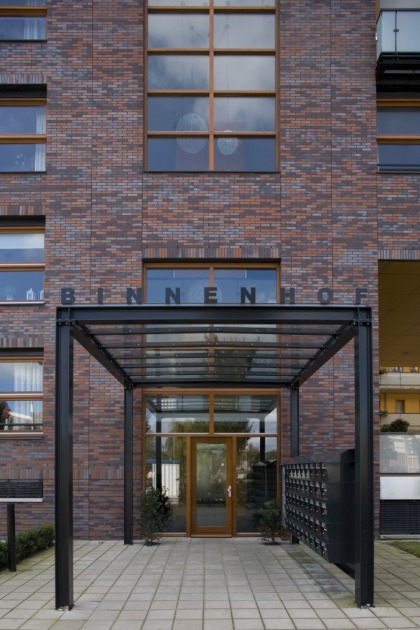 apartment building architect architecture brick balcony