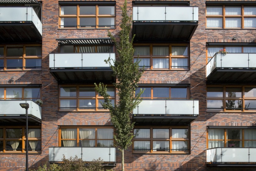 apartment building architect architecture brick balcony