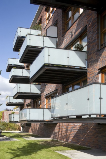 apartment building architect architecture brick balcony